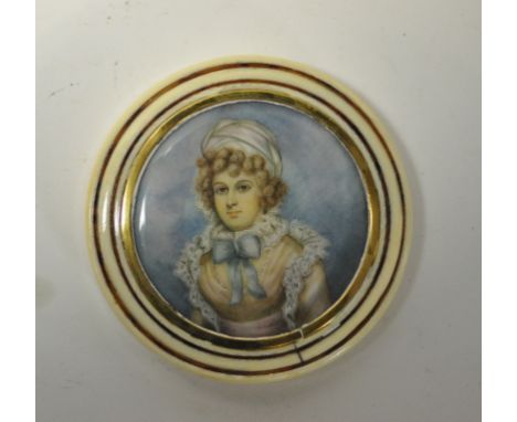 A 19th century ivory snuff box, the cover inset a bust portrait of a lady, watercolour on ivory, 10.5 cm diameter