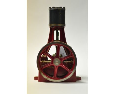 A Stuart vertical live steam engine, with single oscillating cylinder and flywheel, 15 cm high Condition report Report by GHT