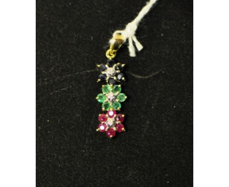 A 9ct gold, ruby, emerald and sapphire triple flowerhead pendant, with diamond centres