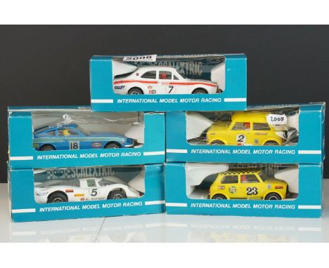 Five boxed Scalextric Rovex slot cars to include C053 Datsun 260Z, C052 Ford Escort Mexico Special Build, C007 Mini Cooper, C