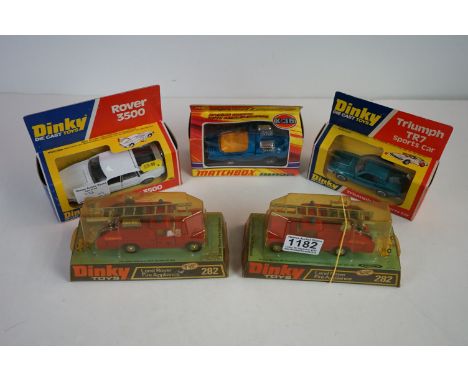 Five boxed diecast models to include Dinky 282 Land Rover Fire Appliance x2, 211 Triumph TR7 Sports Car &amp; 180 Rover 3500,