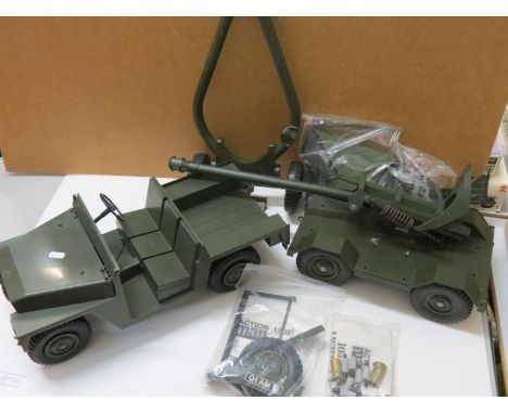 Two original Palitoy Action Man vehicles to include Army Landrover and 105mm Light Gun, with accessories and parts 