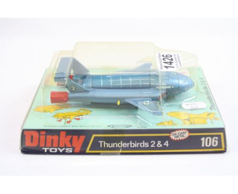 Boxed Dinky 106 Thunderbirds Thunderbird 2 &amp; 4 diecast model, near mint and appearing unopened, slight discolouring and o