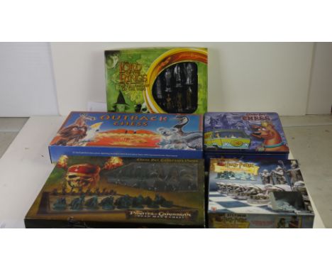 Five contemporary chess sets to include Harry Potter Wizard Chess, Scooby Doo, Lord of the Rings: Fellowship of the Ring, Pir