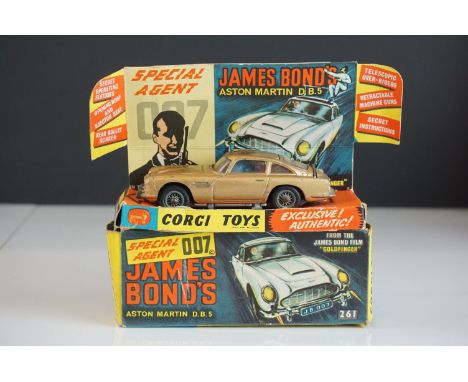 Boxed Corgi 261 James Bond 007 Aston Martin DB5 diecast model with ejector figure, inner display stand but no secret instruct