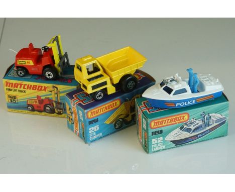 Three boxed Matchbox Superfast diecast models to include 26 Site Dumper, 15 Fork Lift Truck and 52 Police Launcher, diecast e