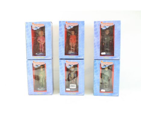 Six Carlton Thunderbirds figures to include Tin Tin, Brains, Kyrano, Parker, Lady Penelope and The Hood, all appear unremoved