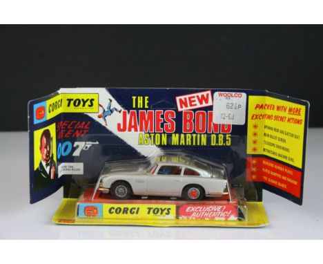 Boxed Corgi 270 The James Bond 007 Aston Martin diecast model appearing to be complete and unremoved from card, some card lif