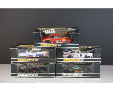 Five boxed Scalextric slot cars to include C130 Triumph TR7, C125 Porsche Turbo 935, C133 Wolf WR5 Formula 1 Car, C123 UOP Sh