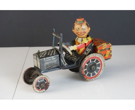 Original Marx tin plate Joy Rider wind up toy, showing wear but fair/gd overall, main damage showing to wheels 