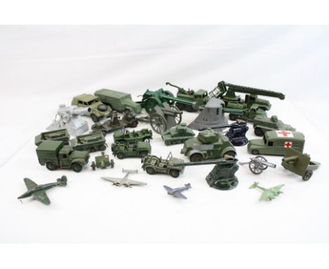 Approx 28 various mid 20th century military diecast models, artillery, planes and searchlights, showing play wear and some re