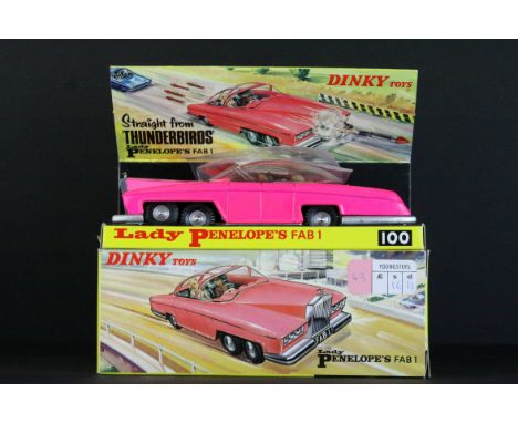 Boxed Dinky 100 Thunderbirds Lady Penelope's Fab 1 diecast model in fluorescent pink, complete with figures, accessories and 