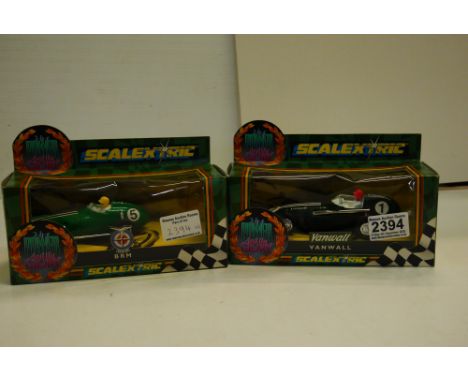 Two boxed Scalextric The Power and the Glory slot cars to include C098 BRM &amp; C097 Vanwall, both excellent 