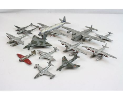 12 Original play worn Dinky diecast model planes to include 706 Viscount, 3 x Seaplane, York etc 