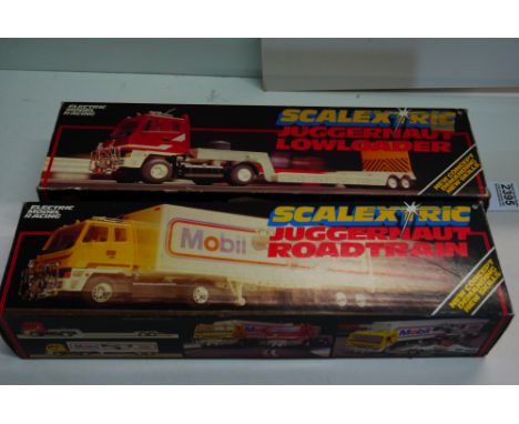 Two boxed Scalextric slot cars to include C301 Juggernaut Road Train and C302 Juggernaut Lowloader, both vg 