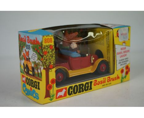 Boxed Corgi 808 Basil Brush diecast model  in near mint condition complete with inner soundbox and 2 x laughter tapes, box ex