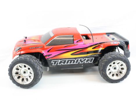 A Tamiya 43525 Nitro Crusher 1/10 scale Truggy on a NDF-01T chassis, fitted with a Tamiya FS-15S 2.5cc 4WD engine. 