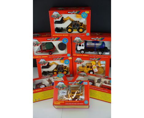 Eight boxed Britains 1:32 scale farming/commercial vehicles, to include 9590 Disc Harrow, 9599 Milk Marque Tanker, 9592 Volac