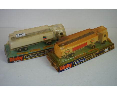 Two boxed Dinky 945 AEC Fuel Tanker diecast models to include ESSO &amp; Chevron, diecast excellent, boxes with some wear inc