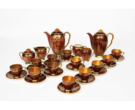 A Carlton Ware Rouge Royale coffee set for six, printed in gilt and enamelled in green with a fruiting grape vine design, com