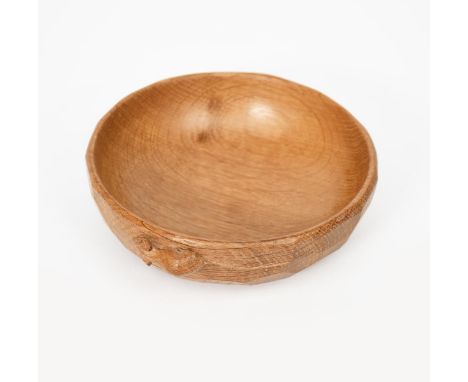 A Robert Mouseman Thompson oak bowl,  adzed circular form with carved mouse signature to side,  17cm. diam.