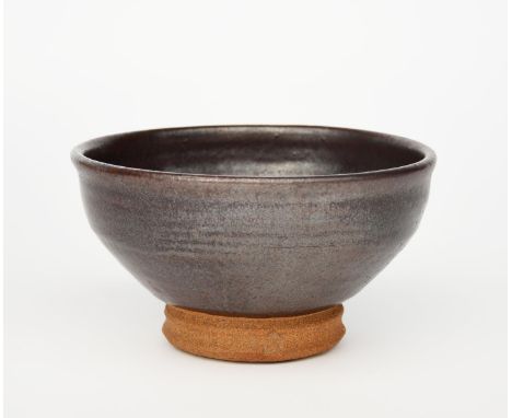 ‡ William Staite Murray (1881-1962) a stoneware footed bowl, covered to the foot with a rich brown glaze to the foot, impress