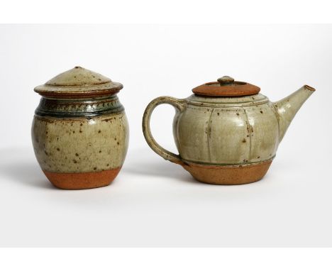 ‡ Richard Batterham (born 1936) a stoneware teapot and cover, ovoid, covered in an ash glaze and a small canister and cover c