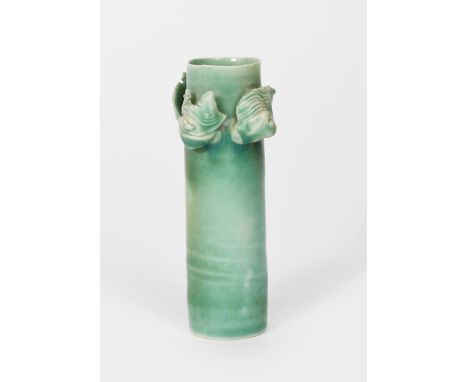 ‡ Colin Pearson (1923-2007) a porcelain winged cylinder vase, with four applied wings, covered to the foot with a celadon gla