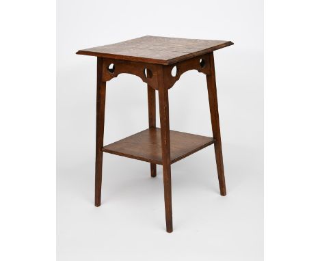 An oak occasional table, square section on flaring, tapering square section legs, with square shelf, the undercarriage with c