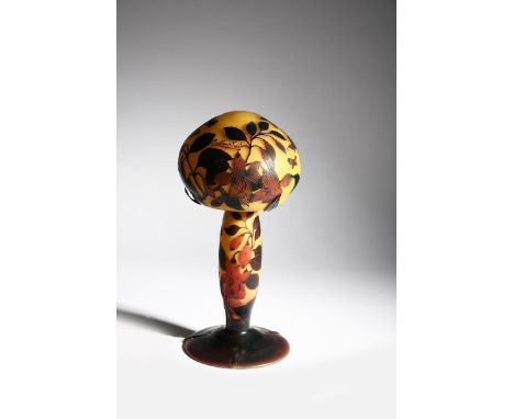A Muller Fres cameo glass table lamp and shade, amber glass cased in red, acid-etched with butterflies flying past  fuchsia f