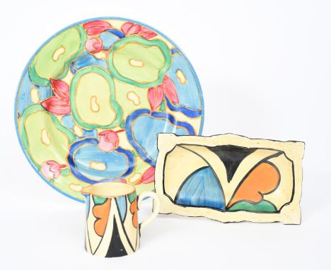 'Blue Chintz' a Clarice Cliff Bizarre plate, painted in colours, a Clarice Cliff 'Double V' jug and a dish printed factory ma