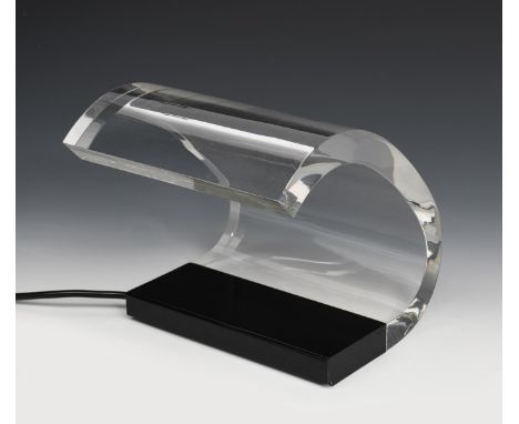 An Oluce Acrylica 271  desk lamp designed by Joe Colombo,  model no.271, curved clear acrylic light on black enamelled metal 