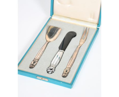 A Georg Jensen Acorn pattern presentation set designed by Johan Rohde, comprising sugar shovel, butter knife and cold-cut for