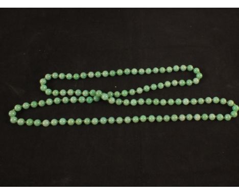 A long Jade bead necklace