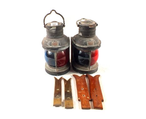 A pair of ships lamps, marked Improved Combination Launch Lamp and brackets