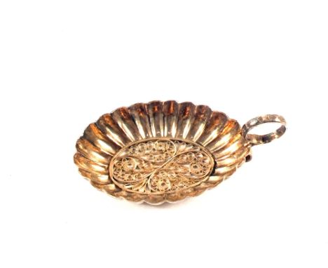 A Georgian Silver filigree caddy spoon, marks indistinct