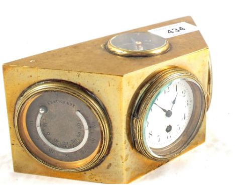 A Brass combination clock, barometer, thermometer and compass