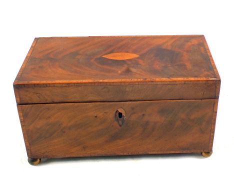 A Georgian inlaid Mahogany two compartment tea caddy with blending bowl