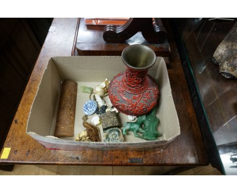 A mixed group of Oriental items, to include: Chinese snuff bottles; Japanese netsuke; a bamboo wrist rest etc. 