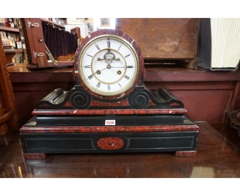 A late 19th century slate and red marble drumhead mantel clock, by Le Roy et Fils, numbered 6516, 55.5cm wide, with original 