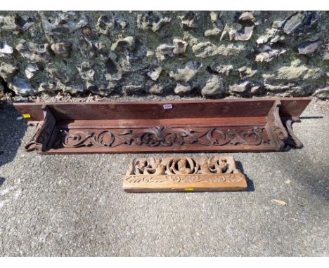 A carved oak wall shelf;&nbsp;together with a small wood carving. 