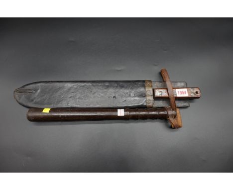 A 1943 machete and leather scabbard,&nbsp;38cm blade; together with an old truncheon. (2) 