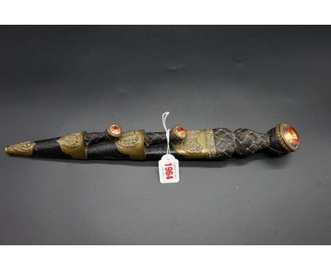 A good 19th century Scottish dirk and brass mounted leather sheath, for the 'Black Watch Highland Regiment', with matching kn