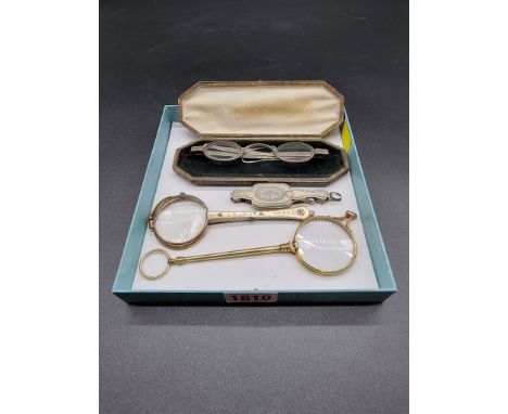 A pair of Georgian silver spectacles,&nbsp;in associated beadwork case; together with three pairs of gilt metal lorgnettes. 