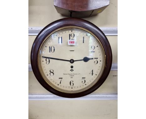 A Smiths mahogany wall clock,&nbsp;the 12in painted dial inscribed with broad arrow and dated 1951. 