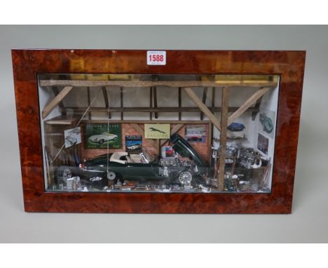 Automobilia: a unique Jaguar E Type workshop diorama, by Patrick Richard, signed and labelled verso, in a burr wood frame, 29