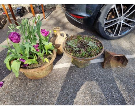 Two old terracotta pots;&nbsp;together with a terracotta ewer and a cast iron hopper.&nbsp; 