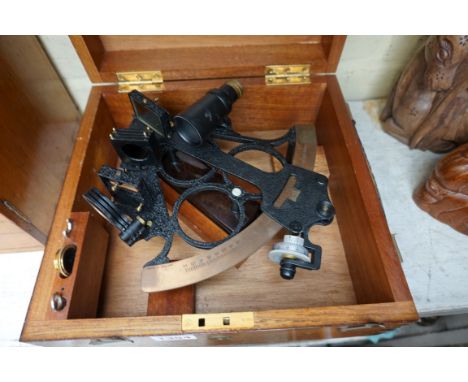 A Sestrel sextant, with brown Bakelite handle, in fitted box. 