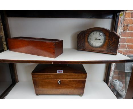 A 19th century mahogany and line inlaid sarcophagus tea caddy,&nbsp;30.5cm wide; together with a 1920s oak timepiece; and an 