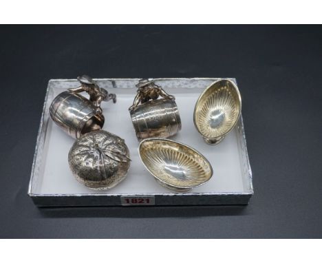 A small group of silver plate,&nbsp;to include a novelty pair of sailor and barrel napkin rings. (5) 